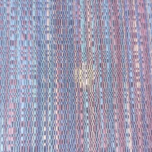 May include: A close-up of a woven fabric with a textured pattern in shades of blue, pink, and white.
