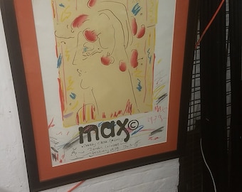 May include: A framed poster with a colorful abstract painting of a person's head. The poster is titled "max" and includes the text "Cherry Creek Gallery, Denver, Colorado, February 3-29, 1979".