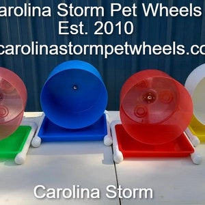 The Carolina Storm Bucket Wheel with litter tray, custom made for hedgehogs, Syrian hamsters and more.