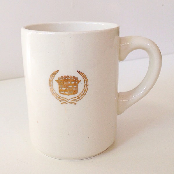 Vintage Cadillac gold souvenir mug