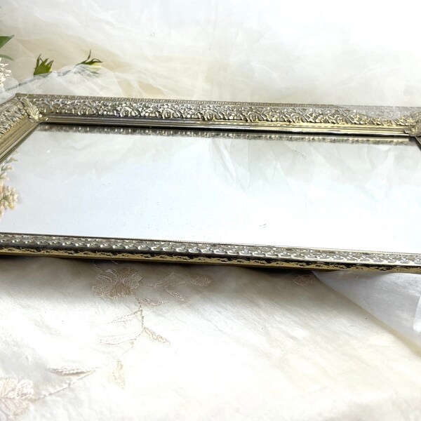 1950s Hollywood Regency style vanity tray with mirrored base Filigree gold tone frame faux suede backing and rubber feet