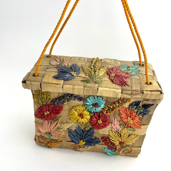 1950s handmade Mexican woven wood large handbag with colorful pink blue yellow and red raffia flowers with yellow rope handles