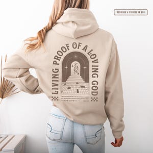 Living Proof of a Loving God Hoodie Boho Christian Sweatshirt for Women Retro Floral Bible Verse T shirt Faith Based Apparel Religious Gift