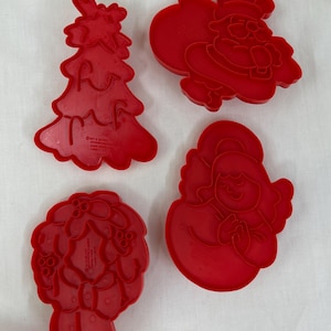 Tagliabiscotti in plastica vintage Wilton Imprint Red del 1978 ~ Ghirlanda di Natale, Albero di Natale, Babbo Natale con sacco, Angelo ~ 4&quot;-5&quot; di altezza ~ Festa