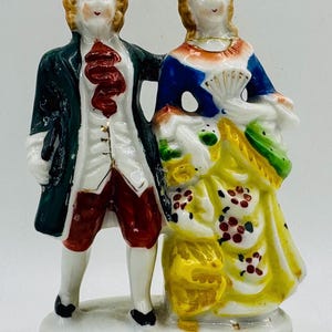 Occupied Japan Figurine: Hand-Painted Colonial Couple, Repaired
