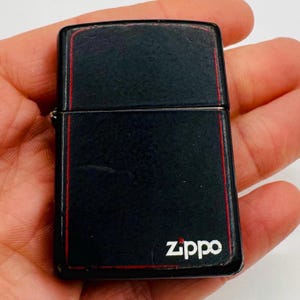 Vintage Zippo Lighter: Black Matte with Red Trim, Made in USA