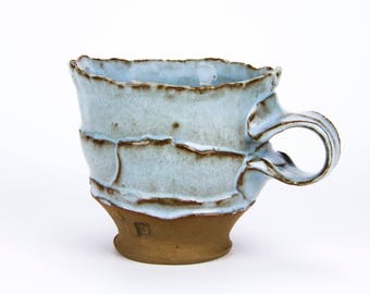 Red Stoneware and Blue Mug