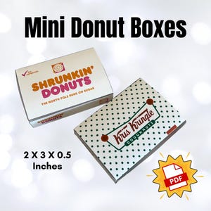 May include: Two mini donut boxes. One box is white with the text "SHRUNKIN' DONUTS" and "THE NORTH POLE RUNS ON SUGAR". The other box is white with green polka dots and the text "Kris Kringle DOUGHNUTS". Boxes measure 2 x 3 x 0.5 inches.