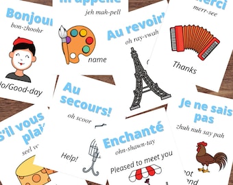 May include: A set of eight flashcards with French phrases and illustrations. The phrases include "Bonjour", "Je m'appelle", "Au revoir", "Au secours", "S'il vous plaît", "Merci", "Enchanté", and "Je ne sais pas".