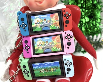 Elf Prop: Miniature handheld Video Game Keychain (red, Pink, Green)