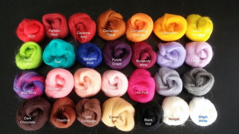 May include: A collection of 24 wool roving colours, including red, green, blue, purple, pink, brown, black, white, and more. Each colour is labelled with its name.