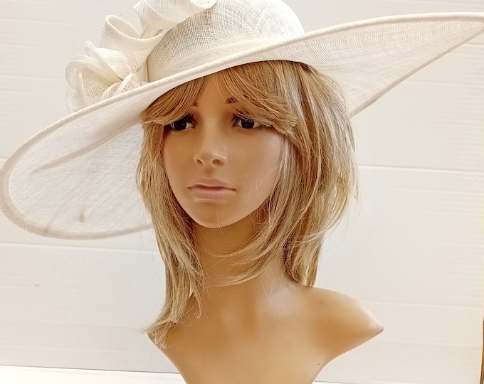 Featured listing image: Ivory or navy Sinamay Statement hatinator on a Headband....Wedding,ascot,