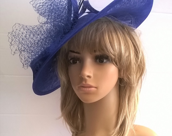 Featured listing image: Sapphire Blue  large Hatinator Sinamay with netting ,curled quills on a Headband..bag seperate purchase.. Lucy