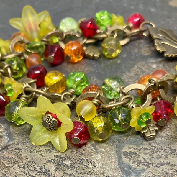 Floral bracelet and earring set, antique bronze bracelet with yellow lucite flowers and glass beads and matching dangle drop earrings