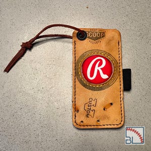 Funda de cuero Rawlings para guante de béisbol y cuchillo
