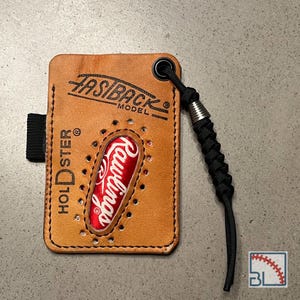 Cartera/tarjetero de cuero Rawlings con diseño de guante de béisbol y orificio para el dedo, con portalápices y cordón