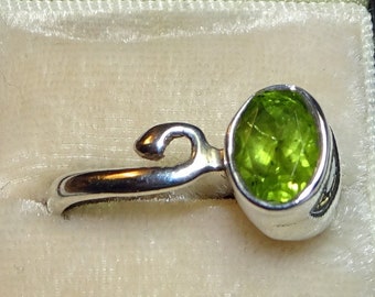 Peridot in Unique Setting Sterling Ring - Size 7