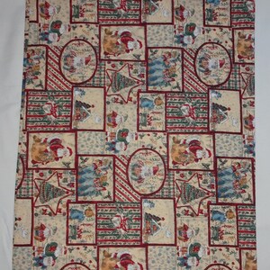 May include: A Christmas-themed fabric bag with a repeating pattern of Santa Claus, Christmas trees, and other holiday imagery. The design features a patchwork style with red, green, and cream colors. The bag has a drawstring closure.