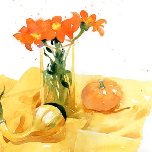 May include: Watercolor still life painting featuring orange flowers in a clear glass vase, a small orange pumpkin, and a yellow gourd. The objects rest on a yellow cloth, creating a warm, autumnal scene. The artwork is rendered in a loose, expressive style.
