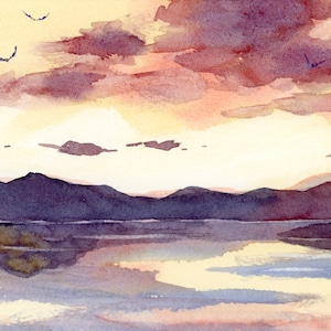 May include: Watercolor painting of a sunset over a lake. The sky features shades of purple and orange, with a few birds in flight. The water reflects the colors of the sky and the dark silhouettes of the mountains.