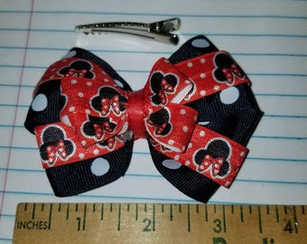 Navy blue polka dots & red bow