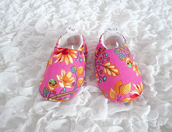 pink baby slippers
