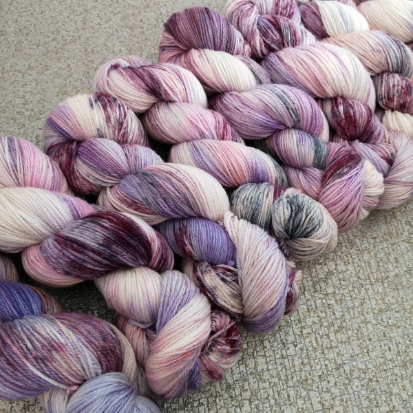South Sea Pearls on fine UK Falkland merino + mulberry silk. Non superwash fingering. Ethically produced and fully traceable sources UK spun