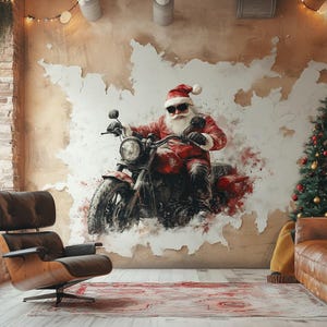 May include: Santa Claus wearing a red suit and sunglasses rides a motorcycle against a white and brown wall. A Christmas tree is in the background.