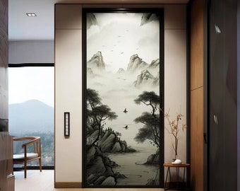 May include: A framed landscape art piece depicting a serene mountain scene in shades of gray and white. The artwork features mountains, trees, a body of water, and flying birds, creating a tranquil and artistic ambiance. The frame is black.