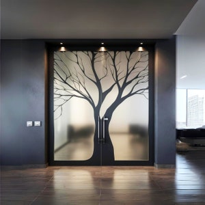 May include: A pair of frosted glass doors with a black tree silhouette design. The doors have black metal frames and handles.