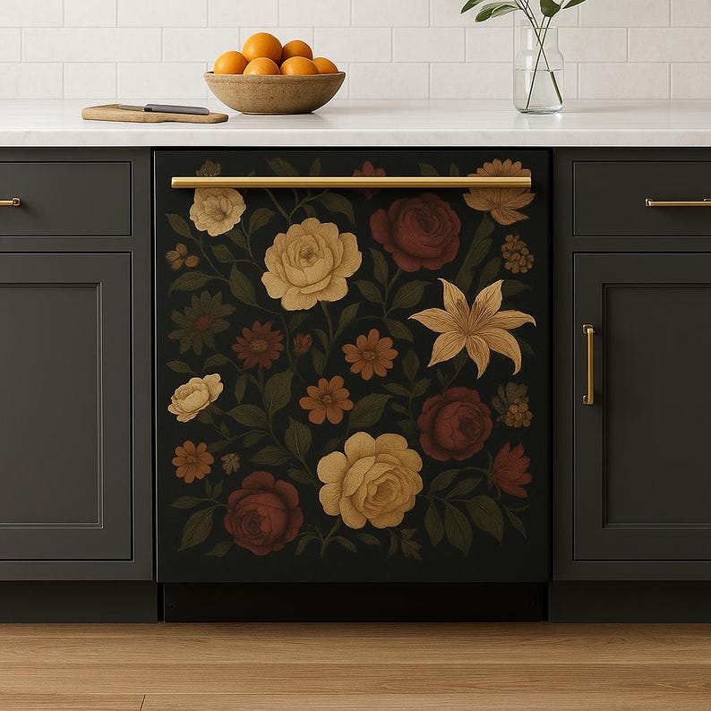 May include: A black dishwasher with a floral design featuring yellow, red, and brown flowers on a dark background. The dishwasher has a gold handle.
