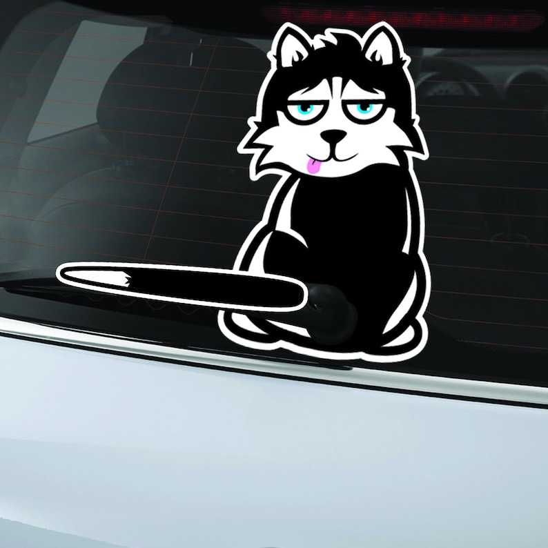 May include: Black and white cartoon sticker of a husky dog with a tongue sticking out. The dog is sitting with its tail sticking out behind it.
