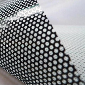 May include: Black perforated vinyl with a grid pattern. The vinyl is translucent and has a glossy finish.