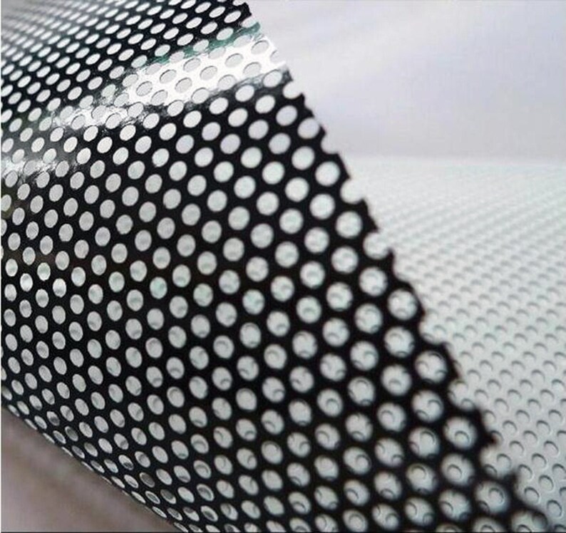 May include: Black perforated vinyl with a grid pattern. The vinyl is translucent and has a glossy finish.