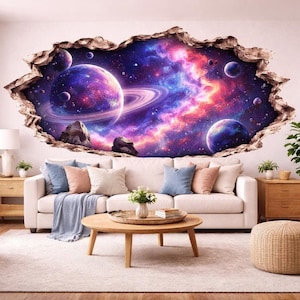 May include: A wall mural depicting a vibrant space scene with planets, nebulae, and galaxies. The artwork creates a 3D effect, appearing as though a hole has been torn in the wall to reveal the cosmos. The mural is above a cream-colored sofa with decorative pillows.