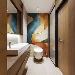 May include: A modern bathroom with a white toilet and a sink with a wooden vanity. The wall behind the toilet features a colorful abstract mural with blue, orange, and green hues.