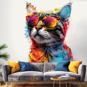 May include: A colorful abstract painting of a cat wearing sunglasses. The cat is surrounded by splashes of red, orange, yellow, blue, and green paint.
