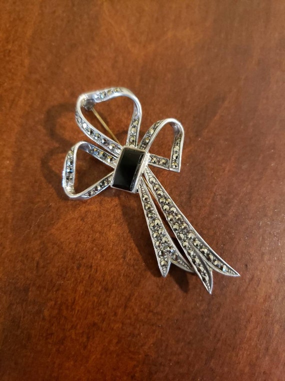 Vintage Silver Bow Brooch with Black Center Stone and Marcasite What are the letters on the back of a marcasite bow brooch? main image 4