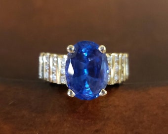 14K Gold LEVIAN TANZANITE & DIAMOND Ring, Size 7.5, 4.32 Cttw (3.87 Oval Tanzanite, .45 Diamonds), 7.6 Grams