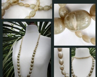 Long graduated sage green, vintage oval graduated plastic beads. marble effect