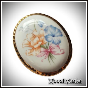 Porcelain oval brooch, painted spring flowers, Limoges style