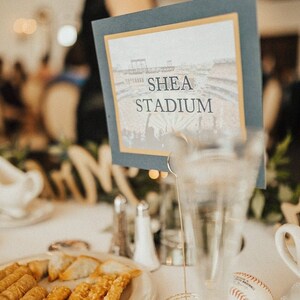 Custom Shea Stadium Wedding Reception Table Sign in a holder