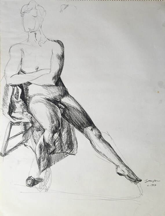 Nude Man Sitting On A Chair