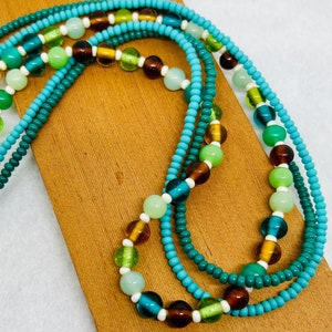 Multi-strand necklace.  Beaded necklace. Three strand necklace with  seed beads,glass czech beads, green and fall colors.