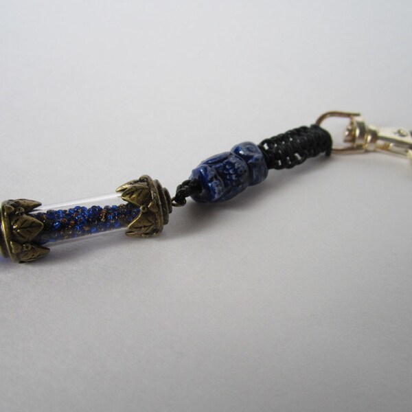 Ravenclaw House Points Keychain, with peruvian ceramic owl and hand-made leather cord.