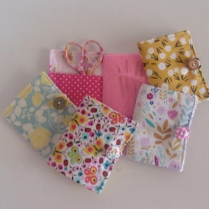 Needle Book w/2 pockets for sewing needles, scissors, thread with button/elastic closure. 3 1/2&quot; tall x 2 3/4&quot; wide. Floral fabrics