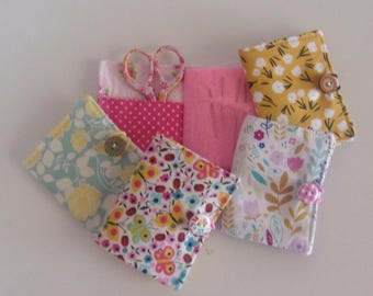 Needle Book w/2 pockets for sewing needles, scissors, thread with button/elastic closure. 3 1/2&quot; tall x 2 3/4&quot; wide. Floral fabrics
