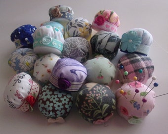 Bottlecap pincushions - BOGO Buy One Get One Free. Prints selected at random.