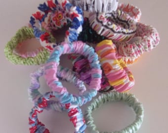 Fabric elastic Bracelet. Fits wrists up To 7.5"