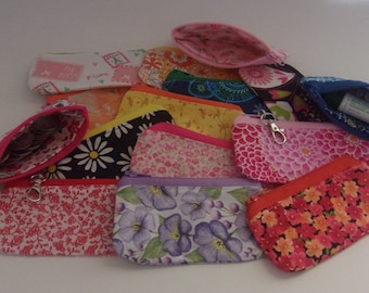 Mini Fabric coin pouch w/zipper, lined. 4 5/8" wide x 2 1/2" high. Optional clasp
